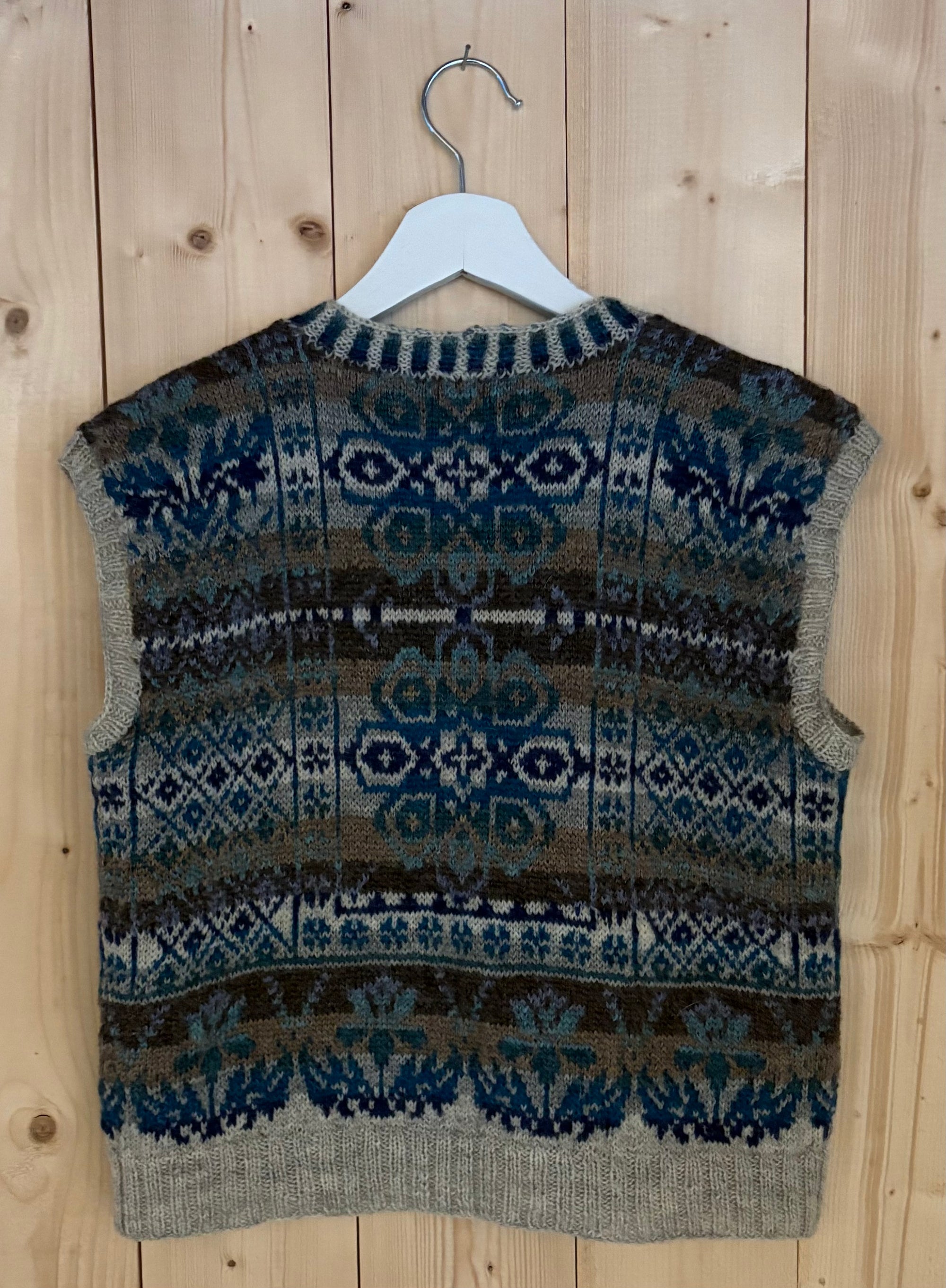 Billedvevs vest i blå toner