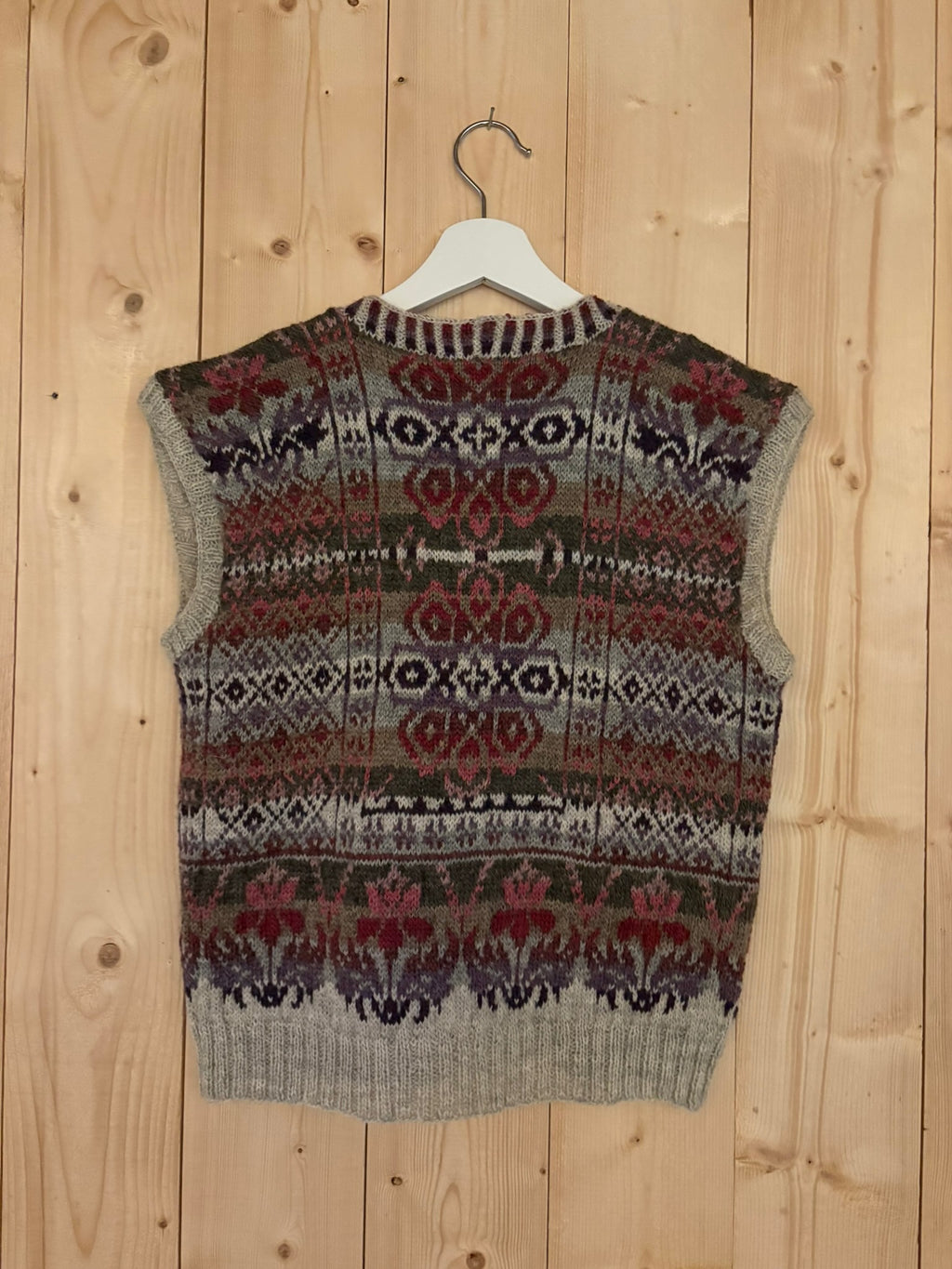 Billedvevs vest i rosa toner