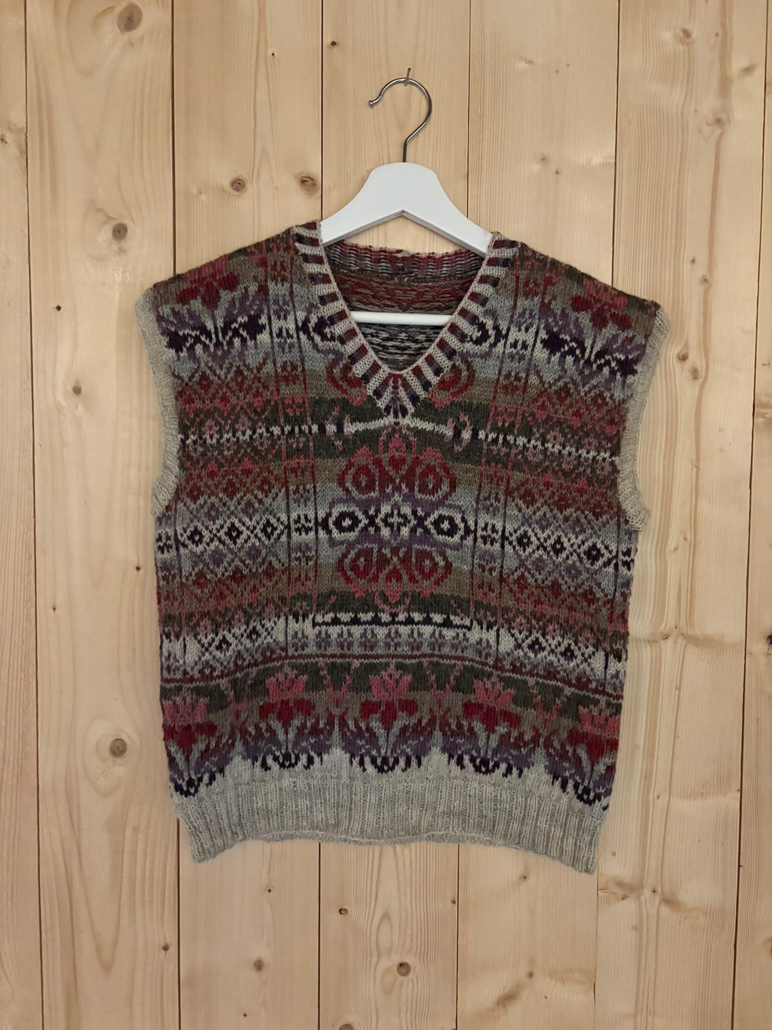 Billedvevs vest i rosa toner