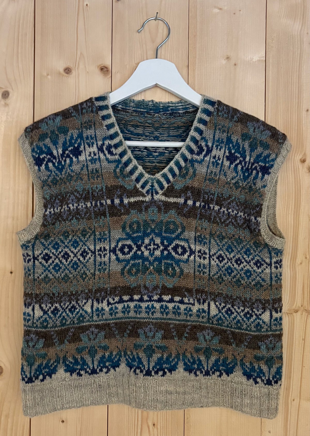 Billedvevs vest i blå toner